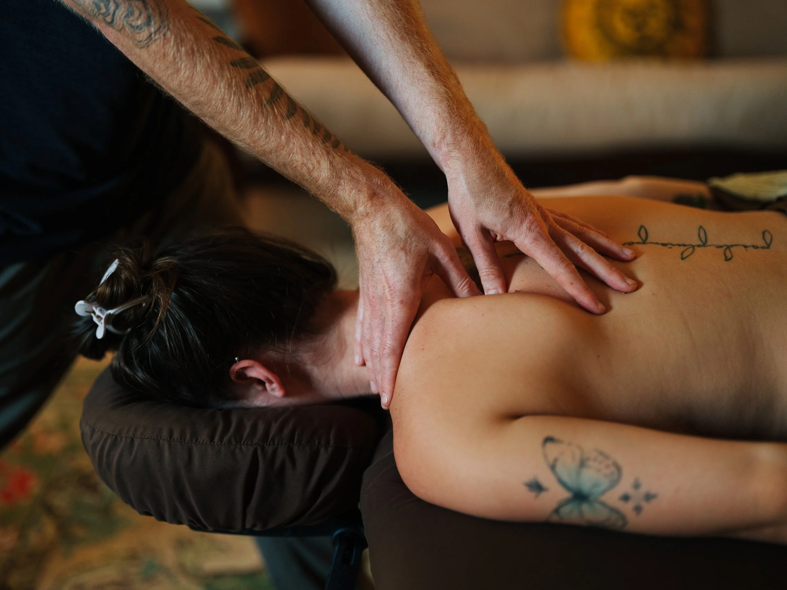Integrative massage therapy session with deep shoulder and back work at Zen Fox Healing Arts in Asheville NC